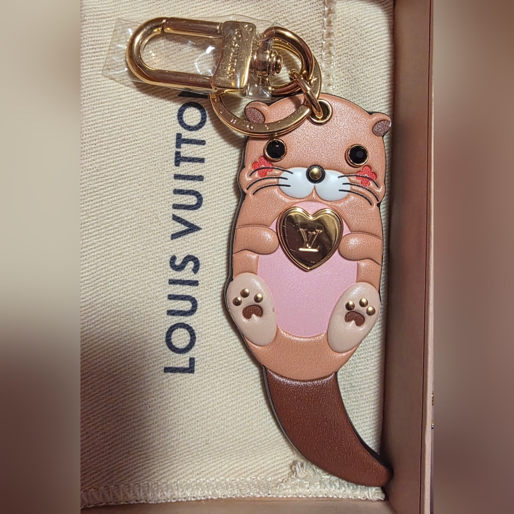 RARE Louis Vuitton Otter Monogram Bag Charm/Key Chain!